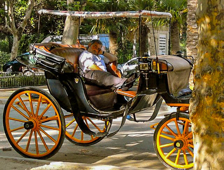Seville coachman's siesta / Where in the World Can You Relax? / The Amigos Project / Karen McCann / EnjoyLivingAbroad.com